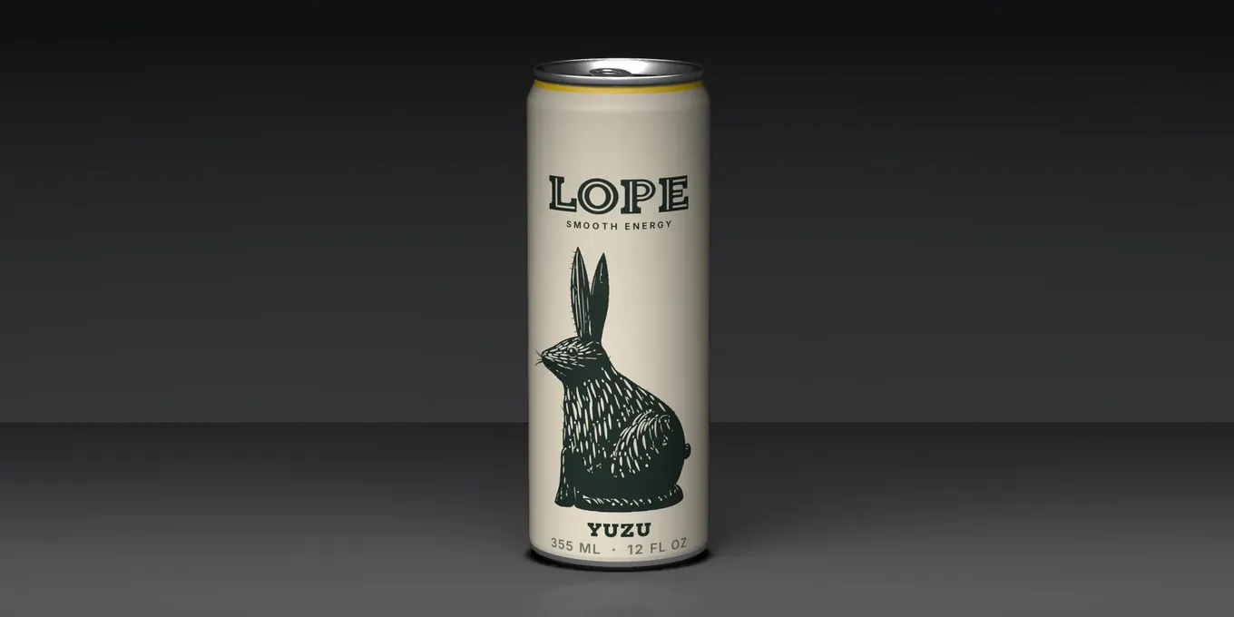 The Lope can, bone-white with its black hare, ears up, in its dark studio: a render from its story